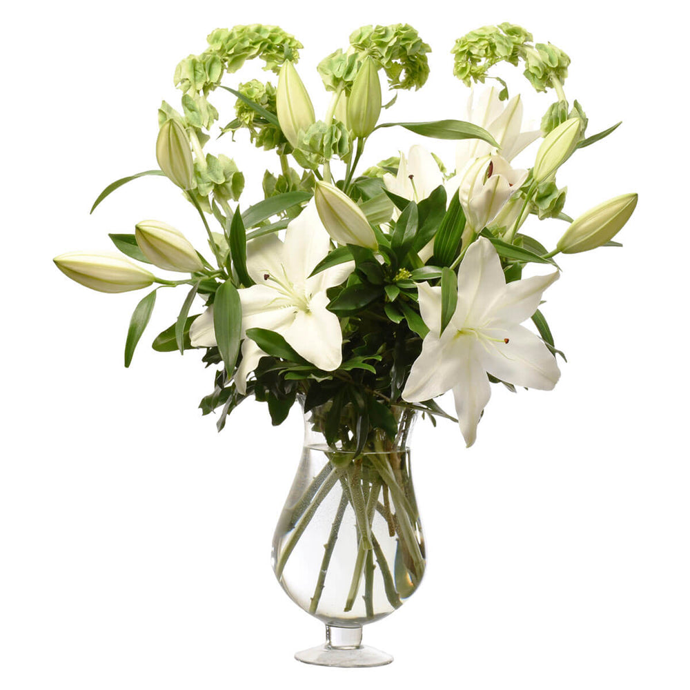 Sympathy and flower arrangement for home in glass container for delivery in Burnaby and Vancouver
