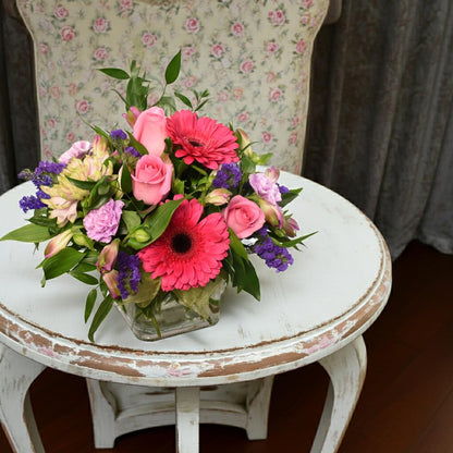 Flower arrangment in pink colours with roses and gerberas for Birthday celebration or get well. Same-day Burnaby and Vancouver Delivery.