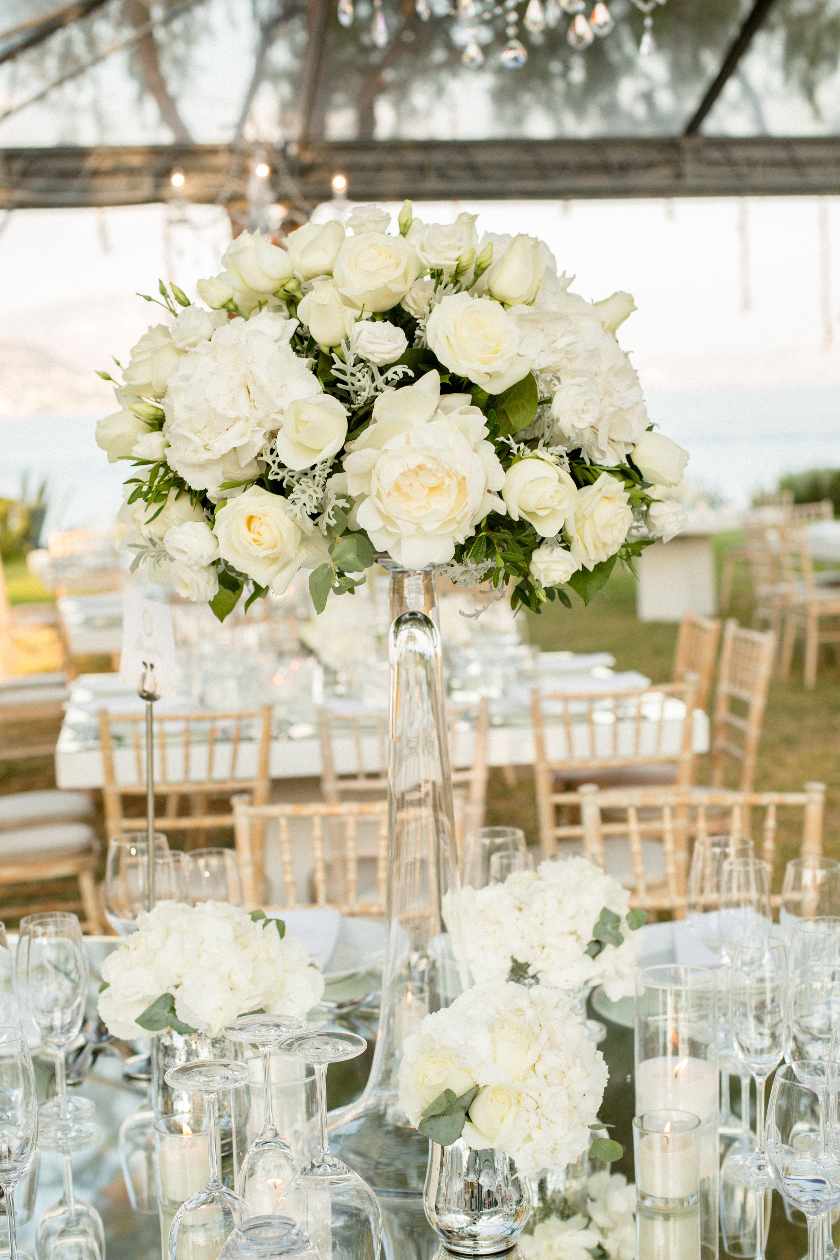 Wedding decor centrepiece with white flowers from wedding florist Adele Rae
