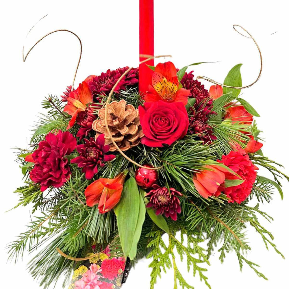 Christmas Flower Centerpice with red roses and red carnations and mums from Burnaby Flower Shop Adele Rae Florists