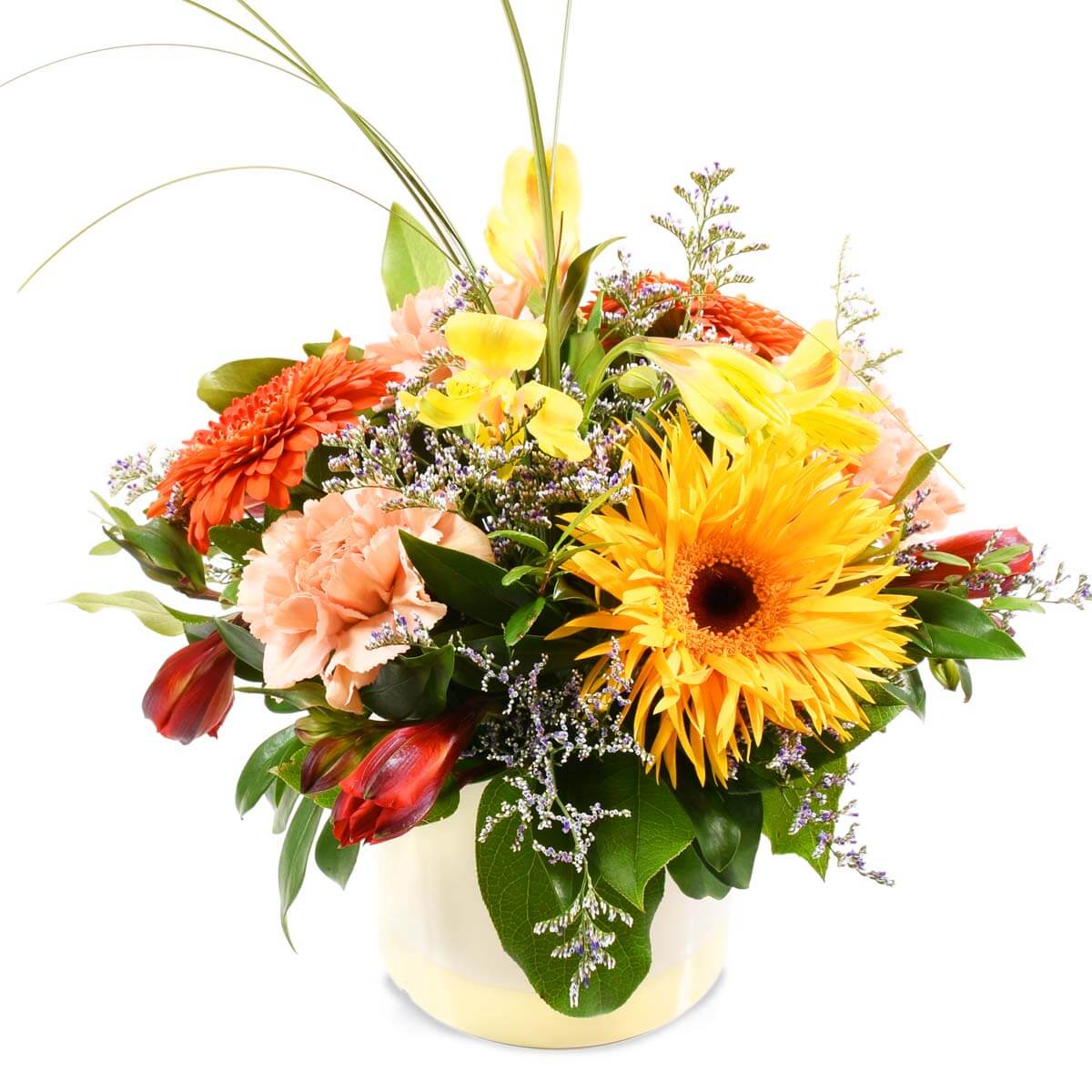 Arrangment in a ceramic cylinder with colourful yellow-orange blooms