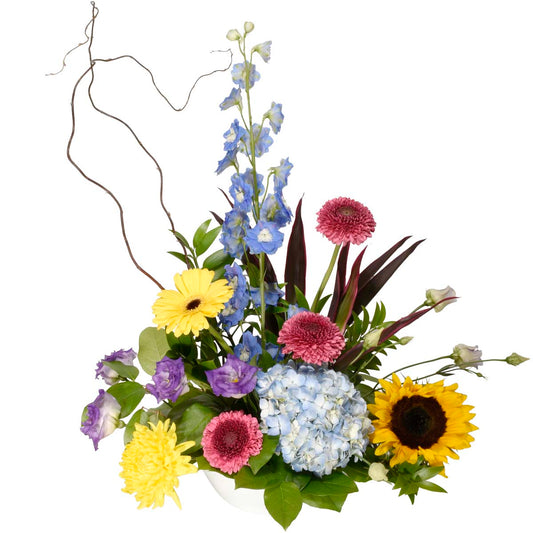 Colourful summer bouquet for birthday with delphinium and helianthus.
