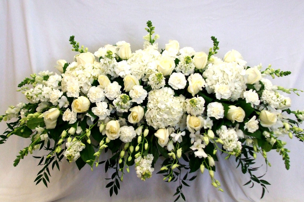 Coffin flower arrangement with all white flowers in Burnaby BC