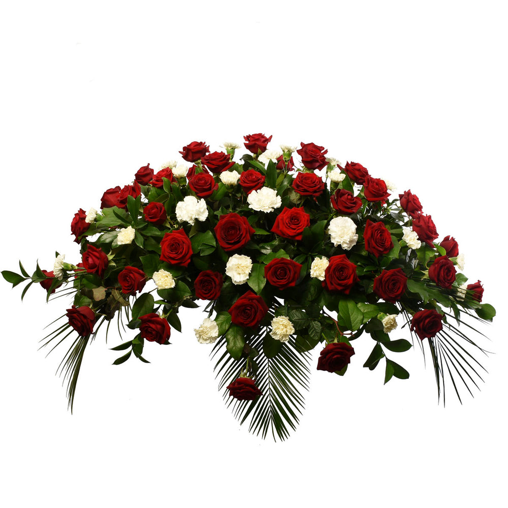Casket spray of medium size with red roses and white carnations for funeral and sympathy occasion for delivery in Vancouver, Burnaby , Coquitlam and Port Moody.