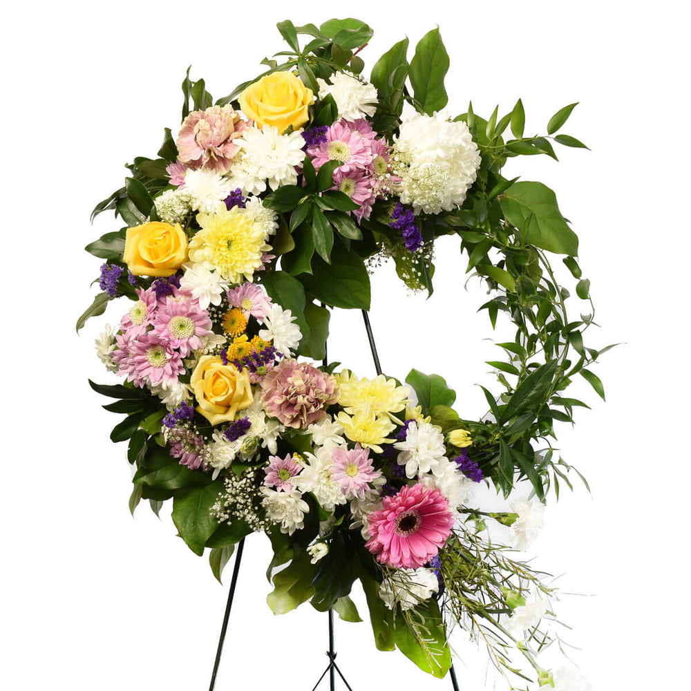 Funeral florist in Burnaby Adele Rae created this mixed flower 18 inch wreath.