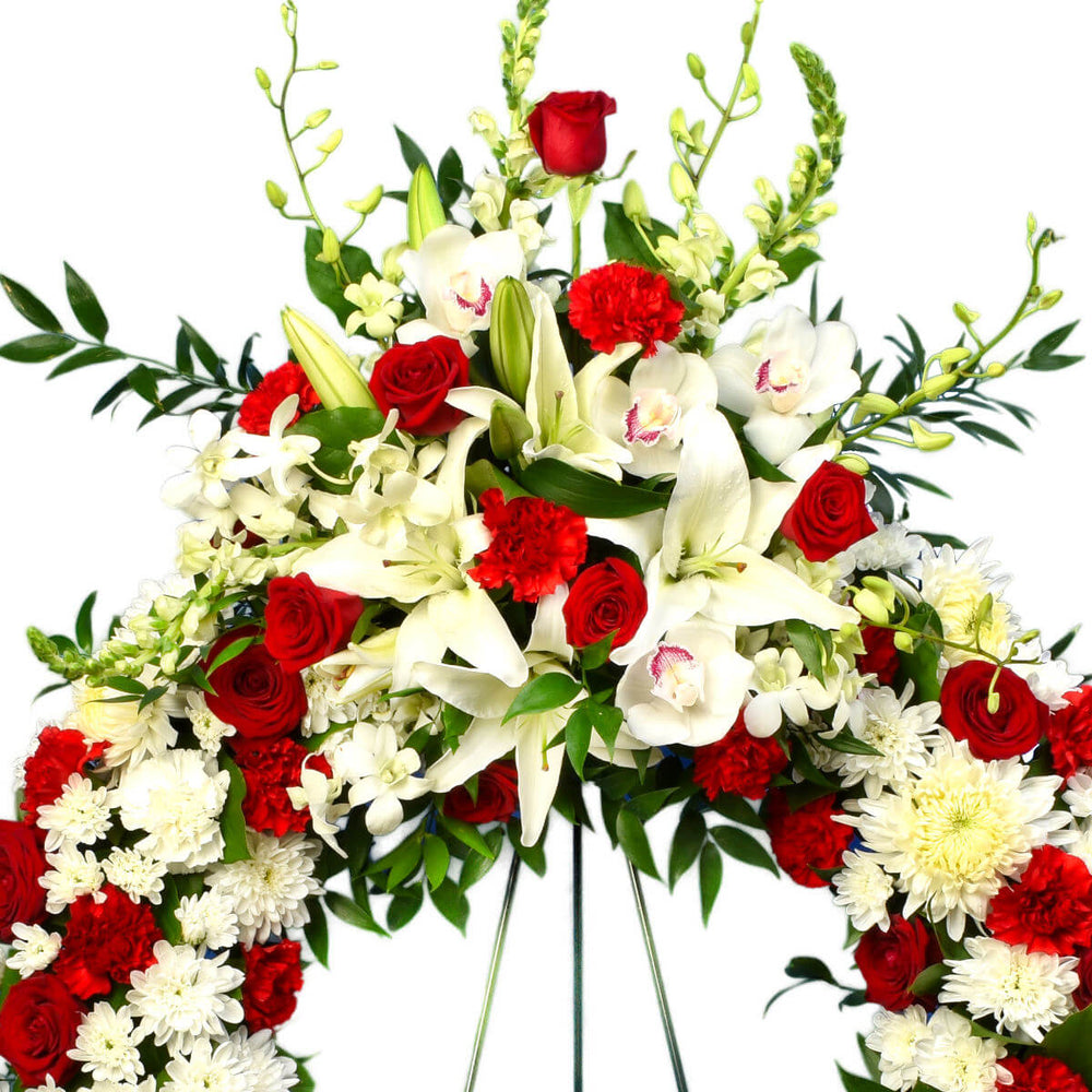 Funeral wreath using red and white flowers for delivery