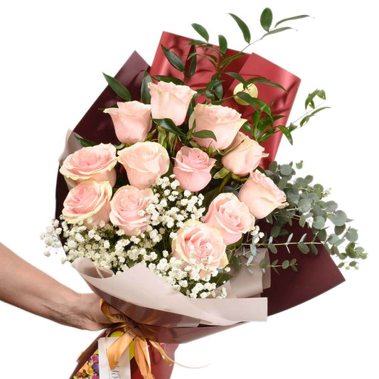 Dozen light pink roses for delivery in Burnaby Canada